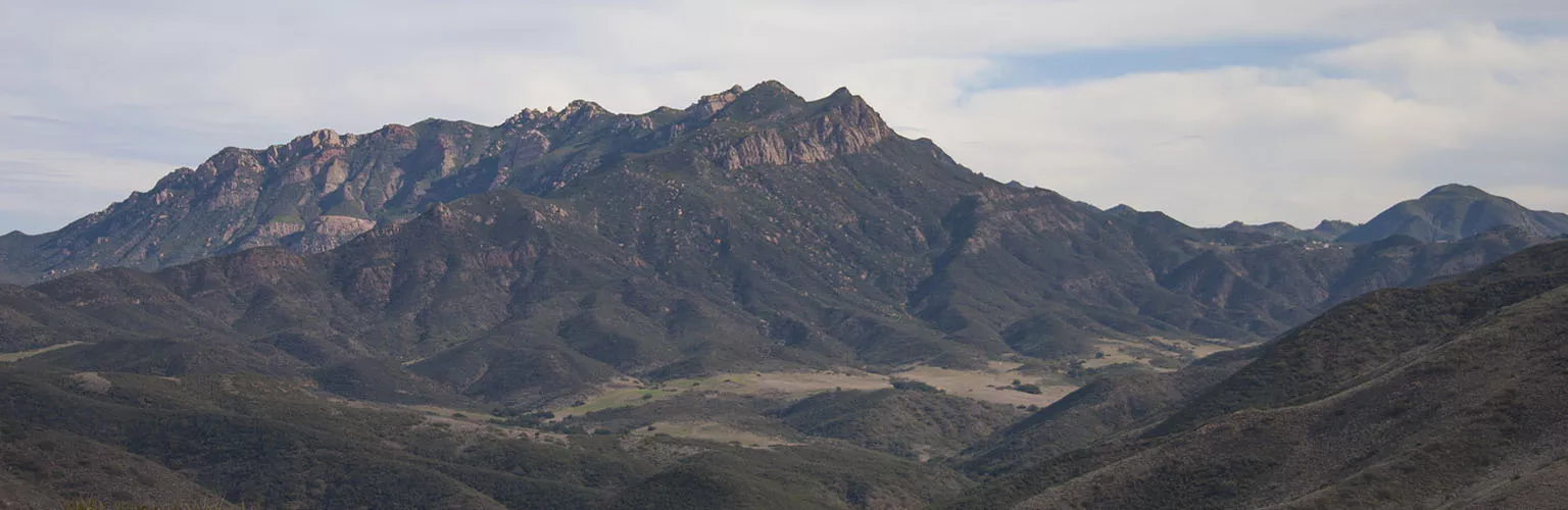 The view of Boney Ridge with Sandstone Peak on top and Serrano Valley below