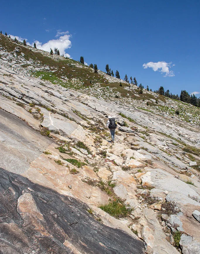 Ascending on the slabs east of Alta Meadows